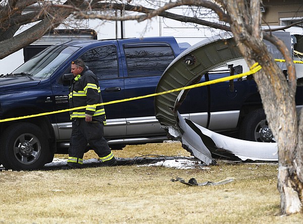 Debris falls from plane during emergency landing near Denver