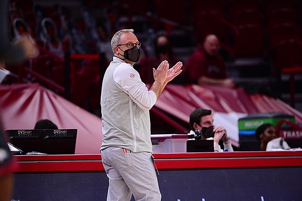 Arkansas coach Mike Neighbors is shown during a game against Ole Miss on Friday, Feb. 19, 2021, in Fayetteville.