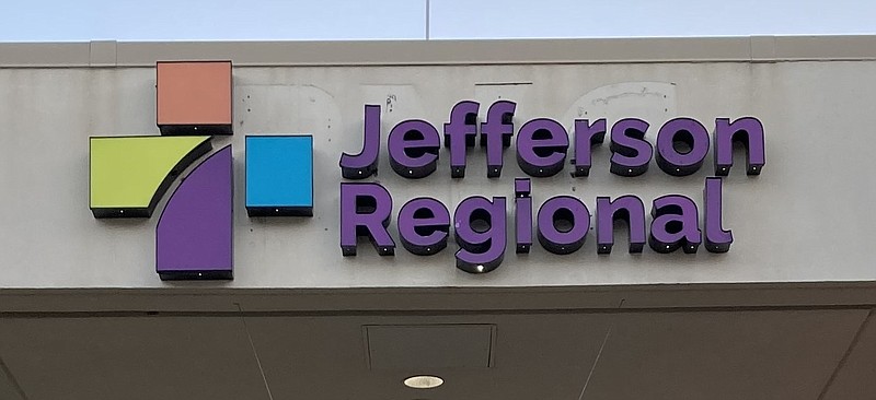 The logo for Jefferson Regional Medical Center in Pine Bluff is shown on the outside of the building in this December 2020 file photo.