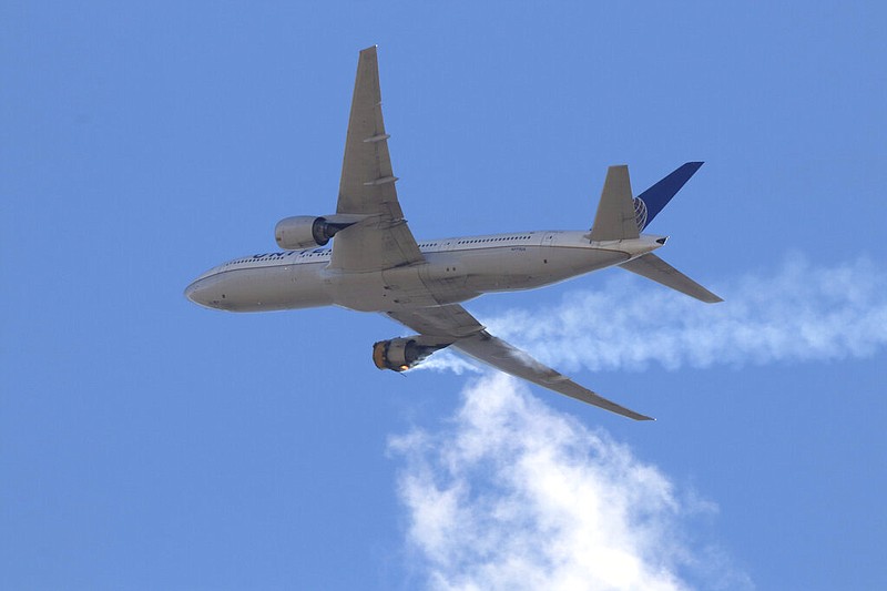 This Saturday, Feb. 20, 2021 photo provided by Hayden Smith shows United Airlines Flight 328 approaching Denver International Airport, after experiencing "a right-engine failure" shortly after takeoff from Denver. story.lead_photo.caption