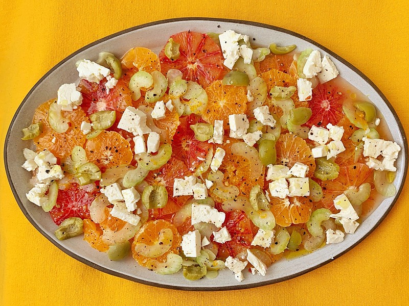 Feta, celery and green olives add just the right amount of saltiness to a salad of sweet orange citrus. (TNS/Los Angeles Times/Ben Mims)