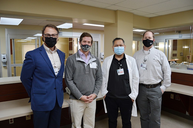 Pictured (L-R): Scott Street, CEO of MCSA, Andrew Thibodeaux of McInnis Brothers Construction, Jonathan Del Mundo, Interim ICU Director, Eric Waller, Executive Director of Engineering and Supply Chain (Contributed)