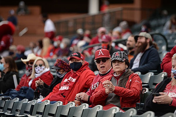 Fans watch during a game between Arkansas and Southeast Missouri State on Thursday, Feb. 25, 2021, in Fayetteville.