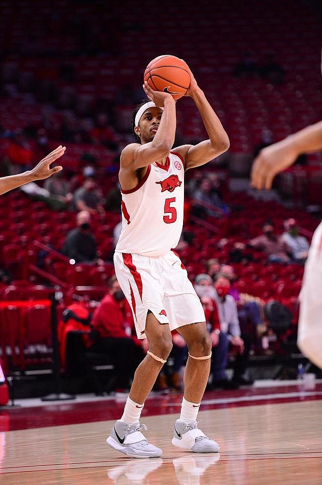 Arkansas’ Moses Moody puts up a shot during a recent SEC game. He had 24 points against Alabama Wednesday night. The Razorbacks will host on LSU at 1 p.m. Saturday. (Arkansas Democrat-Gazette)