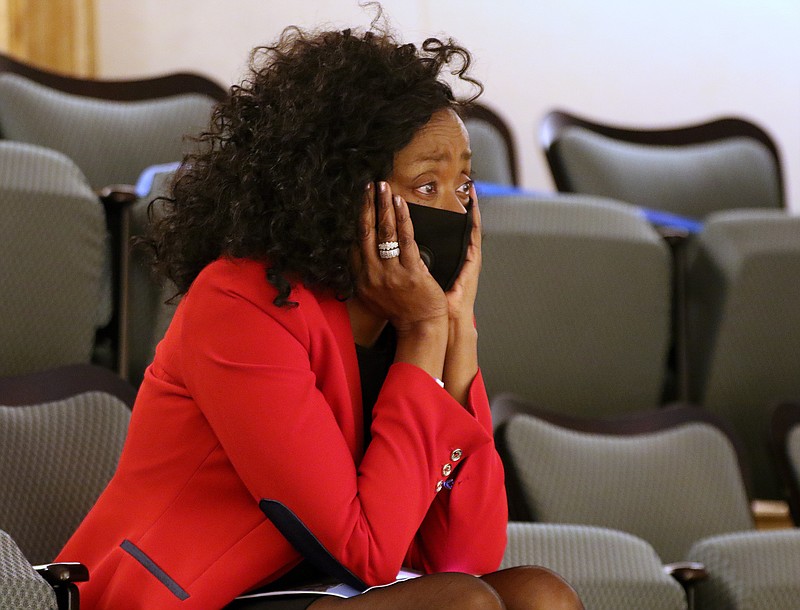 Dr. Charity Smith of Little Rock reacts as she watches the vote count while sitting in the gallery after SB-24, the “Stand Your Ground bill” was voted on during the House session on Wednesday, Feb. 24, 2021, at the State Capitol in Little Rock. “This is devastating,” said Smith. (Arkansas Democrat-Gazette/Thomas Methe)