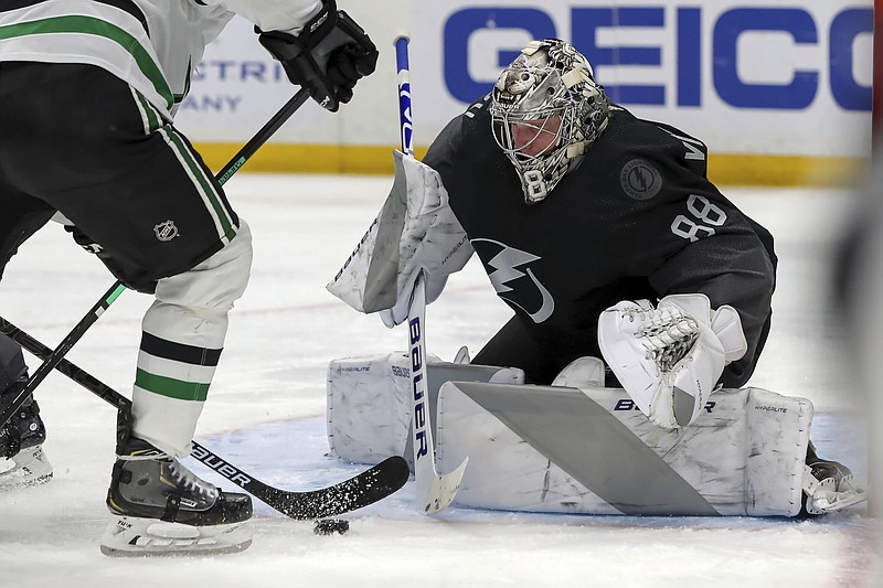 Tampa Bay Lightning goaltender Andrei Vasilevskiy, of Russia, makes a save during the third period of Saturday's game against the Dallas Stars in Tampa, Fla. - Photo by Mike Carlson of The Associated Press