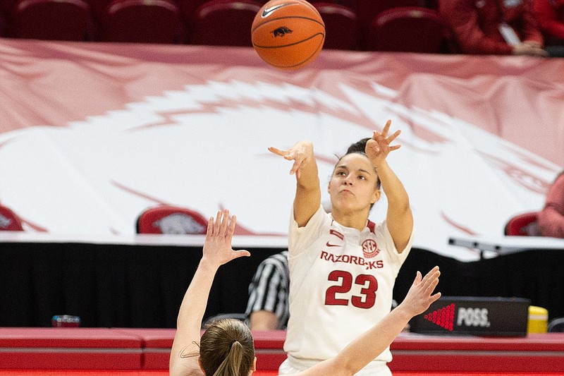 Arkansas guard Amber Ramirez (23) shoots during a game against Alabama on Sunday, Feb. 28, 2021, in Fayetteville.