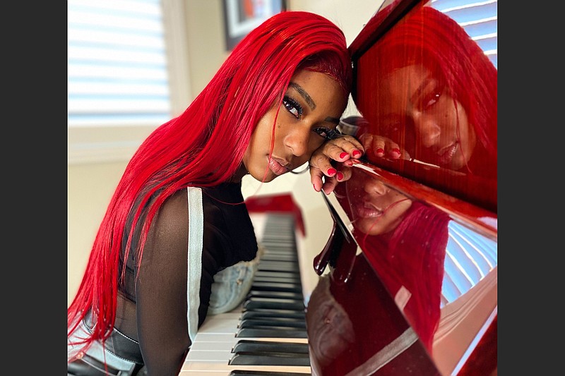 “I don’t fit the country standard, not just being a Black woman, but I got red hair, I wear jumpsuits. I mean, if you look at me, people probably think I look quote-unquote LA. And I was like, ‘I’m not changing that,’” says Reyna Roberts, a 23-year-old aspiring country music star. (Lelanie Foster/The New York Times)