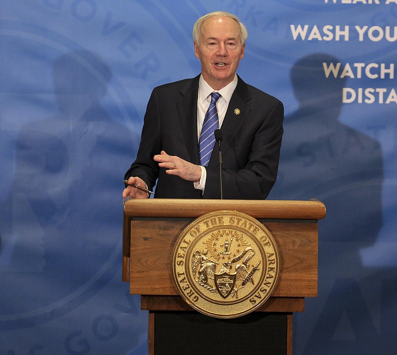 Gov. Asa Hutchinson speaks Tuesday, March 2, at the state Capitol in Little Rock during his weekly COVID update press conference. (Arkansas Democrat-Gazette/Staton Breidenthal)