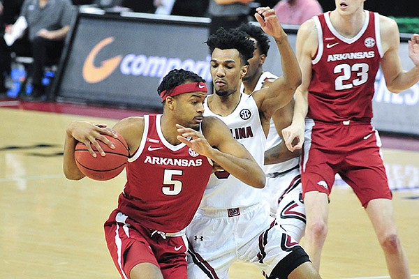 Arkansas guard Moses Moody (5) drives with the ball during a game against South Carolina on Tuesday, March 2, 2021, in Columbia, S.C. (Photo by Ryan Bethea via SEC Pool)