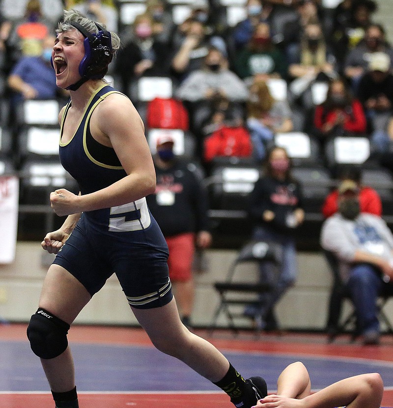 Southside Batesville's Irelan Powell celebrates after beating Mountain Home's Amelia Adams in the 116 weight class championship match during the Arkansas Girls Wrestling State Tournament on Wednesday, March 3, 2021, at the Jack Stephens Center in Little Rock. .More photos at www.arkansasonline.com/34wrestling/.(Arkansas Democrat-Gazette/Thomas Metthe)