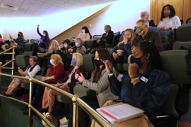 Observers in the House gallery react to the passage of SB-6, a bill to abolish abortion in Arkansas, during the House session on Wednesday, March 3, 2021, at the state Capitol in Little Rock. .More photos at www.arkansasonline.com/34bill/.(Arkansas Democrat-Gazette/Thomas Metthe)