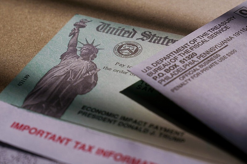 A federal stimulus check issued to help combat the adverse economic effects of the covid-19 outbreak is seen in San Antonio on Thursday, Jan. 28, 2021. (AP/Eric Gay)