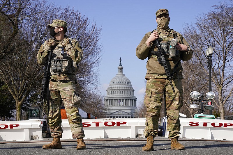 National Guard keep watch on the Capitol, Thursday, March 4, 2021, on Capitol Hill in Washington. (AP Photo/Jacquelyn Martin)