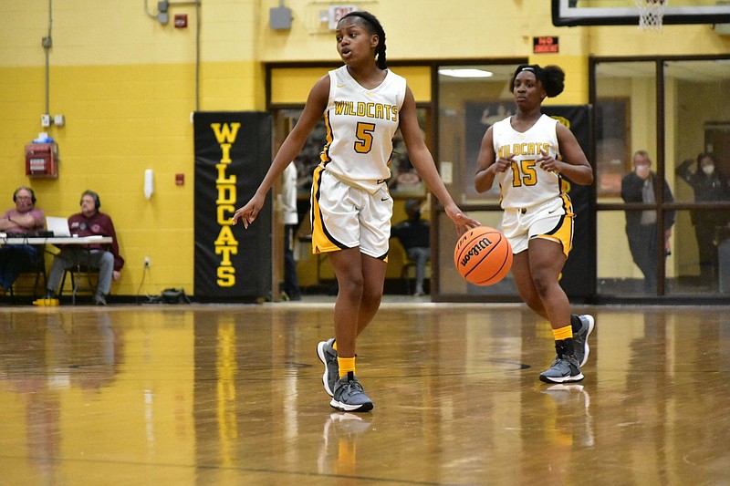 Tatyana Barbee (5) and DaNasia Massey (15) of Watson Chapel will tip off today's action in the 4A South Region tournament facing Arkadelphia in Star City. (Pine Bluff Commercial/I.C. Murrell)