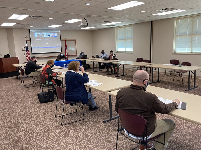 Officials with Liberty Utilities, the United Way and the city of Pine Bluff met Wednesday to put the finishing touches on a plan to help residents fix their plumbing that was damaged during the mid-February winter storms. (Pine Bluff Commercial/Byron Tate)