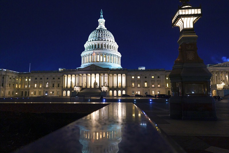The Capitol is seen at dusk in Washington as work is stalled on the Democrats' $1.9 trillion covid-19 relief bill on Friday, March 5, 2021. (AP/J. Scott Applewhite)