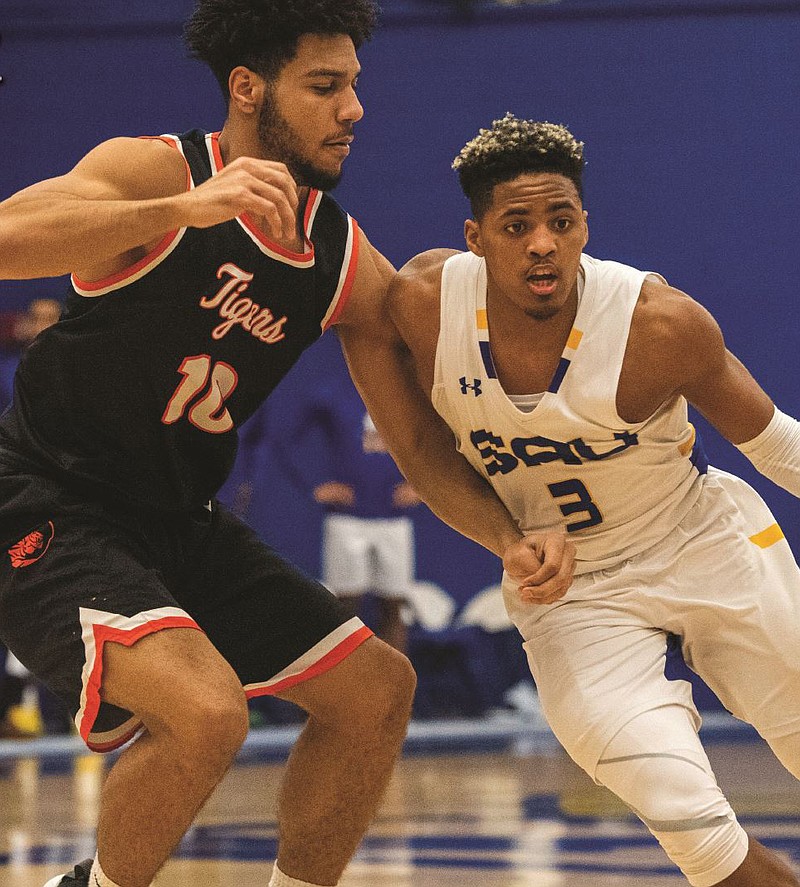 SAU senior Aaron Lucas battles with a East Central Tigers during GAC Tournament action Wednesday at the W.T. Watson Center. The Muleriders will play at Oklahoma Baptist tonight, with the winner earning a spot in Sunday’s championship game. (SAU Sports)