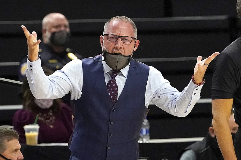 Texas A&M head coach Buzz Williams reacts against Missouri during the first half of an NCAA college basketball game Saturday, Jan. 16, 2021, in College Station, Texas. (AP Photo/Sam Craft)