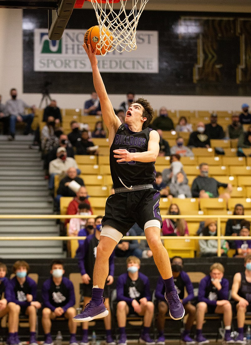 Matthew Wayman (20) of Fayetteville on the fast break to the basket against Bentonville at Tiger Arena, Bentonville,  AR, Friday, March 5, 2021 / Special to NWA Democrat-Gazette/ David Beach