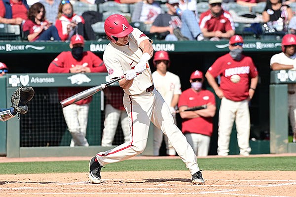 Arkansas third baseman Jacob Nesbit hits a home run during a game against Murray State on Sunday, March 7, 2021, in Fayetteville.