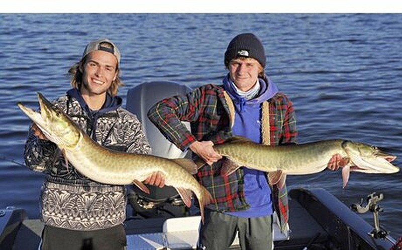 In their attempt to catch the state fish in all 50 states, Luke Konson (left) and Daniel Balserak caught trophy muskellunge at the same time in Wisconsin.
(Photo submitted by Luke Konson and Daniel Balserak)