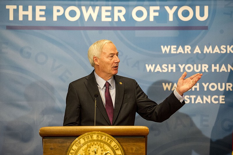 Governor Hutchinson addresses the media during a press conference on Monday, March 8. He announced that he was making everyone in vaccine eligibility phase 1-B eligible to receive the COVID-19 vaccine effective immediately. (Arkansas Democrat-Gazette/Stephen Swofford)