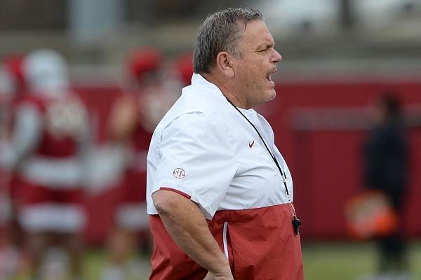 Arkansas coach Sam Pittman watches Tuesday, March 9, 2021, during practice at the university practice field in Fayetteville. Visit nwaonline.com/210310Daily/ for the photo gallery.