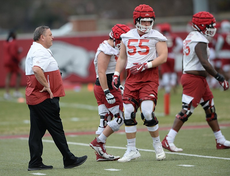 Arkansas coach Sam Pittman watches Tuesday, March 9, 2021, as offensive linemen take part in a drill during practice at the university practice field in Fayetteville. Visit nwaonline.com/210310Daily/ for today's photo gallery. .(NWA Democrat-Gazette/Andy Shupe)