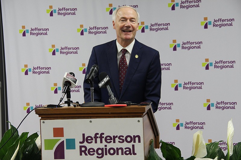 Gov. Asa Hutchinson applauded the staff at Jefferson Regional Medical Center on Thursday, saying it led the way in the state in creating best practices for dealing with the coronavirus. (Pine Bluff Commercial/Eplunus Colvin)