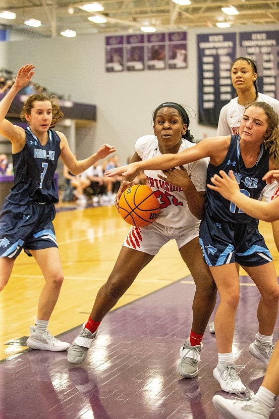 Haitiana Releford (left) of Fort Smith Northside fights toward the basket against Springdale Har-Ber’s Maddux McCrackin during Thursday’s game at the Class 6A girls state tournament in Fayetteville. More photos available at arkansasonline.com/312girls6a. (Special to the NWA Democrat-Gazette/David Beach)