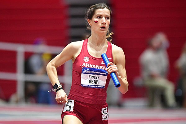 Arkansas' Krissy Gear runs in the distance medley relay during the NCAA Indoor Track and Field Championships on Friday, March 12, 2021, in Fayetteville.