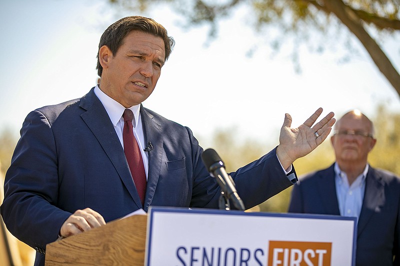 Florida Gov. Ron DeSantis (shown) and California Gov. Gavin Newsom have experienced almost identical outcomes in covid-19 case rates in their states despite differing approaches. More photos at arkansasonline.com/314covid19/.
(AP/Ocala Star-Banner/Alan Youngblood)