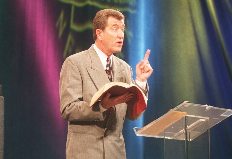 Happy Caldwell, founder of Victory Television Network, reads a passage from the Bible during a network telethon in this April 1998 file photo. (Arkansas Democrat-Gazette file photo)