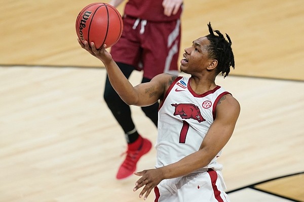 Arkansas' JD Notae (1) puts up a shot during the second half of a first round game against Colgate at Bankers Life Fieldhouse in the NCAA men's college basketball tournament, Friday, March 19, 2021, in Indianapolis. (AP Photo/Darron Cummings) Arkansas' JD Notae (1) puts up a shot during the second half of a first round game against Colgate at Bankers Life Fieldhouse in the NCAA men's college basketball tournament, Friday, March 19, 2021, in Indianapolis. (AP Photo/Darron Cummings)