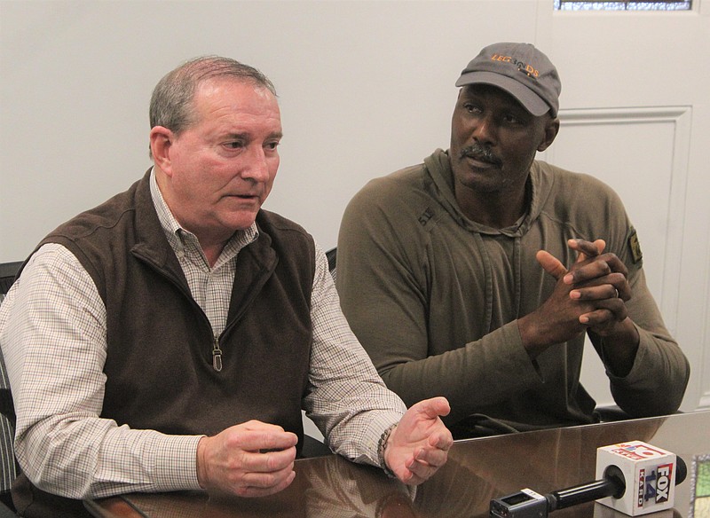 Jeff Teague, left, and Karl Malone both donated $20,000 to a fund they started to assist the injured victims of the recent refinery fire. They are urging local businesses, banks and residents to contribute to the fund, all of which, they said, will be distributed equally among the fire victims. (Matt Hutcheson/News-Times)