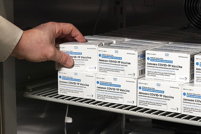 Pharmacist Jack Kann places boxes of the Johnson & Johnson covid-19 vaccine into a refrigerator at South Shore University Hospital in Bay Shore, N.Y., on Wednesday, March 3, 2021. Janssen Pharmaceuticals is a division of Johnson & Johnson. (AP/Mark Lennihan)