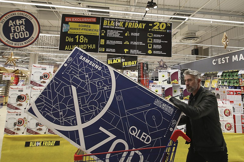 A customer shops in a Carrefour Shopping center in Cesson, France, in this file photo. Carrefour said Wednesday that it will buy Walmart’s stores in Brazil, leaving Walmart owning only a small share of Carrefour Brazil.
(AP)