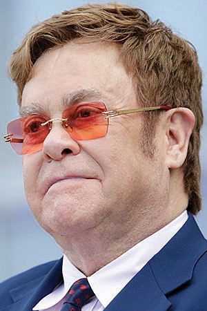 This June 21, 2019 file photo shows Elton John at a ceremony honoring him with the Legion of Honor in Paris. 
 (AP Photo/Lewis Joly, Pool, File)