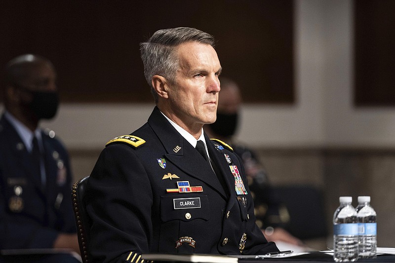 Special Operations Command Gen. Richard Clarke speaks at a hearing to examine United States Special Operations Command and United States Cyber Command in review of the Defense Authorization Request for fiscal year 2022 and the Future Years Defense Program, on Capitol Hill, Thursday, March 25, 2021, in Washington. (Anna Moneymaker/The New York Times via AP, Pool)