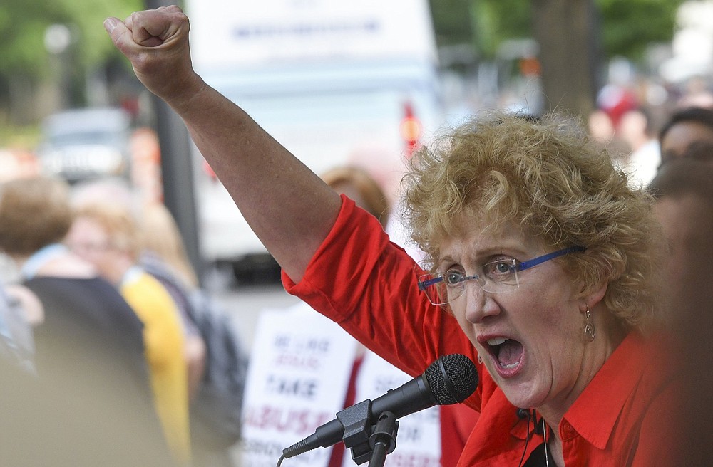 Christa Brown of Denver, speaks during a rally in Birmingham, Ala., outside the Southern Baptist Convention’s annual meeting on June 11, 2019. Brown, an author and retired lawyer, says she was abused by a Southern Baptist minister as a child. She has been pushing the denomination to create an independently run database listing pastors and other church personnel who have been credibly accused of abuse.
(AP/Julie Bennett)