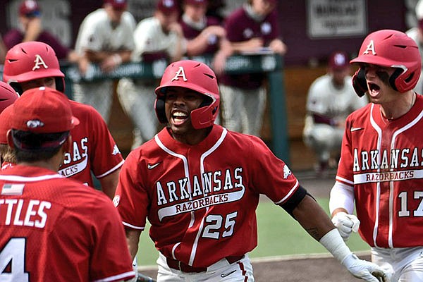 Arkansas center fielder Christian Franklin (25) celebrates after hitting a three-run home run during a game against Mississippi State on Saturday, March 27, 2021, in Starkville, Miss. Franklin's home run came with two outs in the fifth inning — one of 13 two-out home runs this year for the Razorbacks. (Courtesy photo via Aaron Fitt/D1Baseball.com)