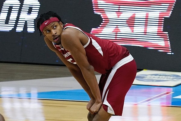 Arkansas guard Moses Moody (5) looks to the scoreboard during the second half of an Elite 8 game against Baylor in the NCAA men's college basketball tournament at Lucas Oil Stadium, Tuesday, March 30, 2021, in Indianapolis. Baylor won 81-72. (AP Photo/Darron Cummings)
