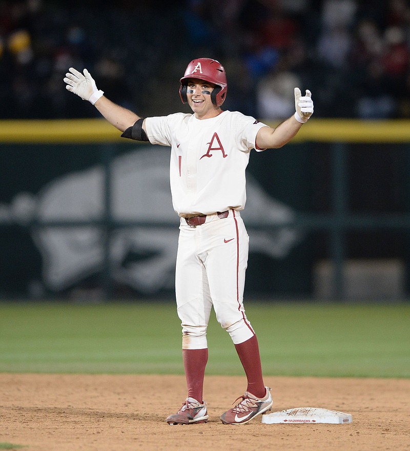 Arkansas second baseman Robert Moore celebrates Tuesday, March 30, 2021, after hitting a double to compete the cycle during the sixth inning of play against Central Arkansas in Baum-Walker Stadium in Fayetteville. Visit nwaonline.com/210331Daily/ for today's photo gallery. .(NWA Democrat-Gazette/Andy Shupe)