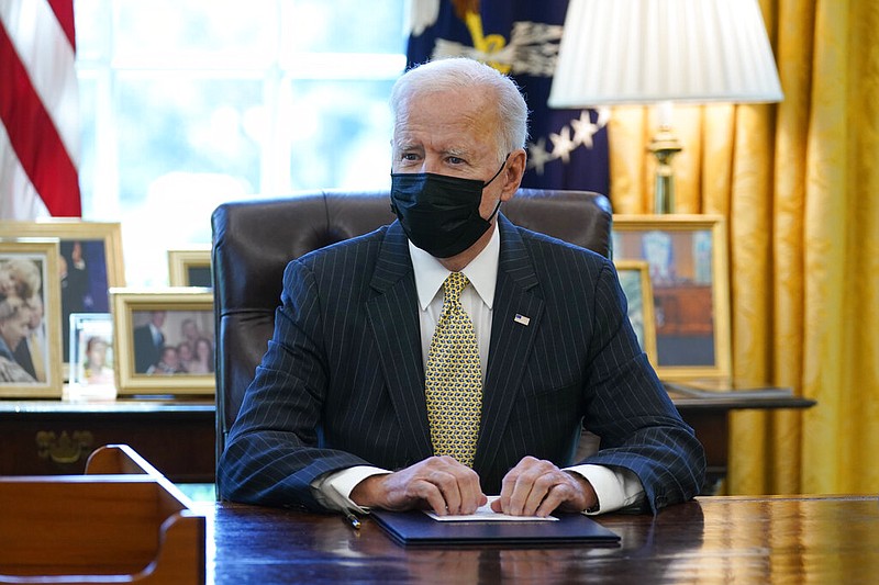 In this March 30, 2021, President Joe Biden speaks after signing the PPP Extension Act of 2021, in the Oval Office of the White House in Washington. Biden wants $2 trillion to reengineer America’s infrastructure and expects the nation’s corporations to pay for it. (AP/Evan Vucci)