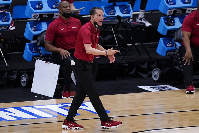 Arkansas head coach Eric Musselman watches against Baylor during the first half of an Elite 8 game in the NCAA men's college basketball tournament at Lucas Oil Stadium, Monday, March 29, 2021, in Indianapolis. (AP Photo/Michael Conroy)