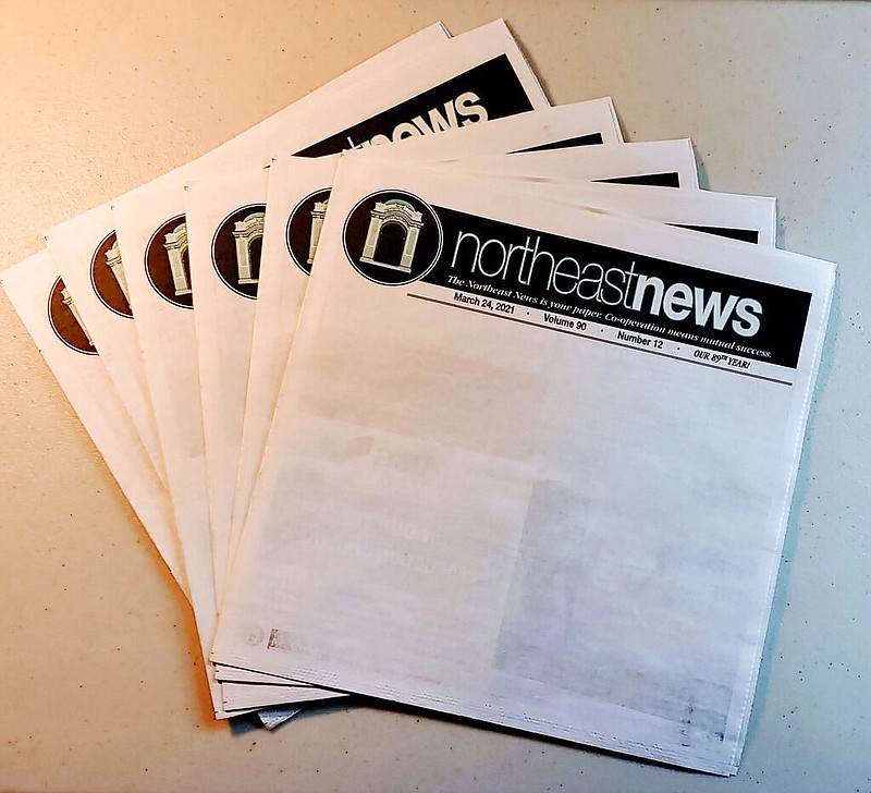 Copies of the March 24, 2021, edition of The Northeast News, which featured a blank front page, are displayed in Kansas City, Mo., on March 26, 2021. The paper chose to leave the front page of their March 24 issue blank to show community members what they'd miss if the newspaper folded. (The Northeast News via AP)