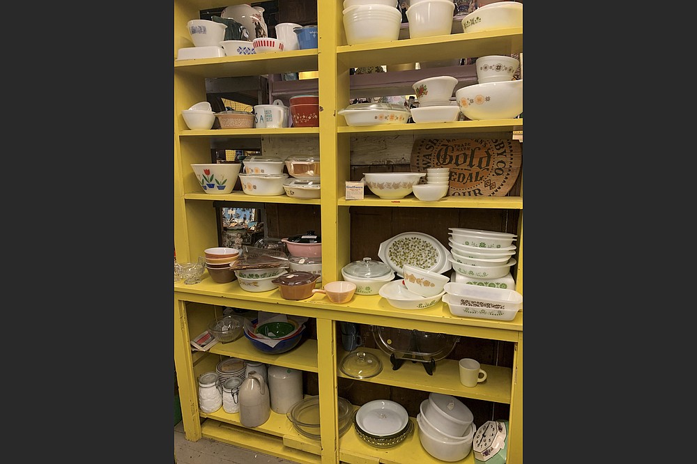 This image shows one area of vintage dishes for sale at “Downstairs at Felton Antiques” in Waltham, Massachusetts. Some collectors buy vintage dishware to try to re-sell it at a profit, while others are in it for nostalgia. (Tracee Herbaugh via AP)