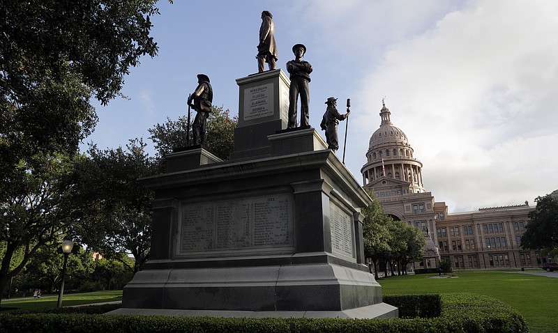In this Aug. 21, 2017 file photo, the Texas State Capitol Confederate Monument stands on the south lawn in Austin, Texas. As a racial justice reckoning continues to inform conversations across the country, lawmakers nationwide are struggling to find solutions to thousands of icons saluting controversial historical figures. (AP Photo/Eric Gay, File)