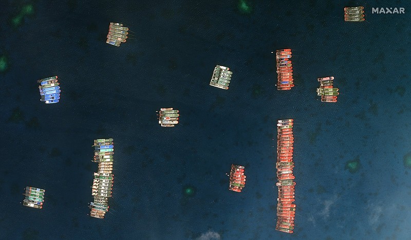 Chinese vessels anchor last week at the Whitsun Reef in the South China Sea. The U.S. has expressed support for the Philippines in its standoff with Beijing over the disputed area.
(AP/Maxar Technologies)